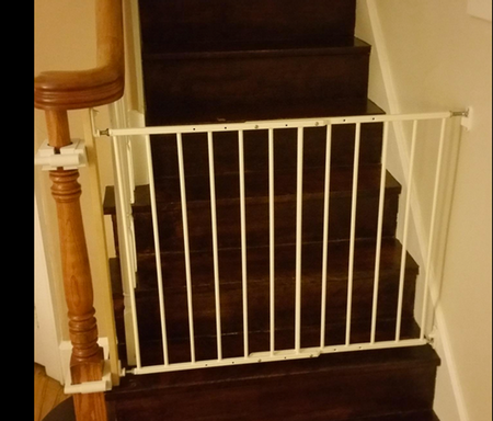 top of stairs baby gate with cat door