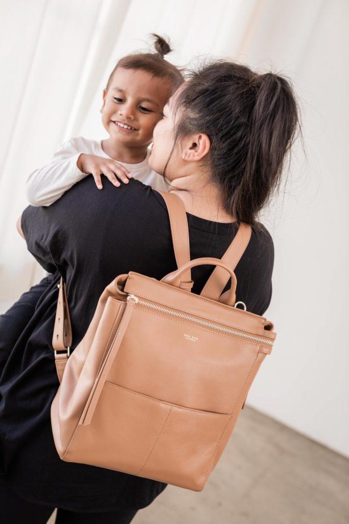 The Babymel Robyn diaper bag is so functional that you can use it as a  backpack or a shoulder bag. It has a multiway strap with shoulder…